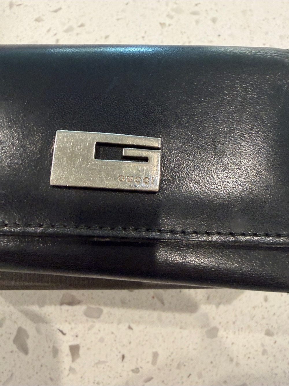 Gucci Black Leather key holder with Silver G Plaque